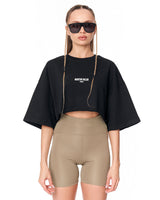 T-shirt crop-top nera oversize "Slogan" designer con stampa