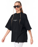 Urban DNA Applique Patch Oversized Black T-shirt styled with white shorts