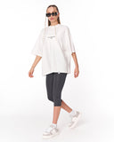 Urban DNA Applique Patch Oversized White T-shirt styled with grey leggings